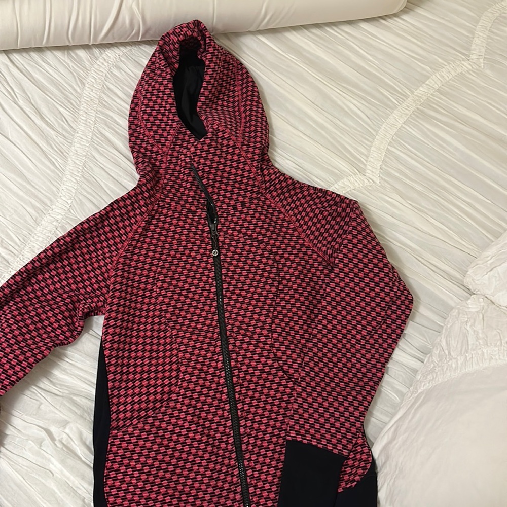 Lululemon zip up. Size 6 women’s. Pink and black. Almost new worn a few times.
